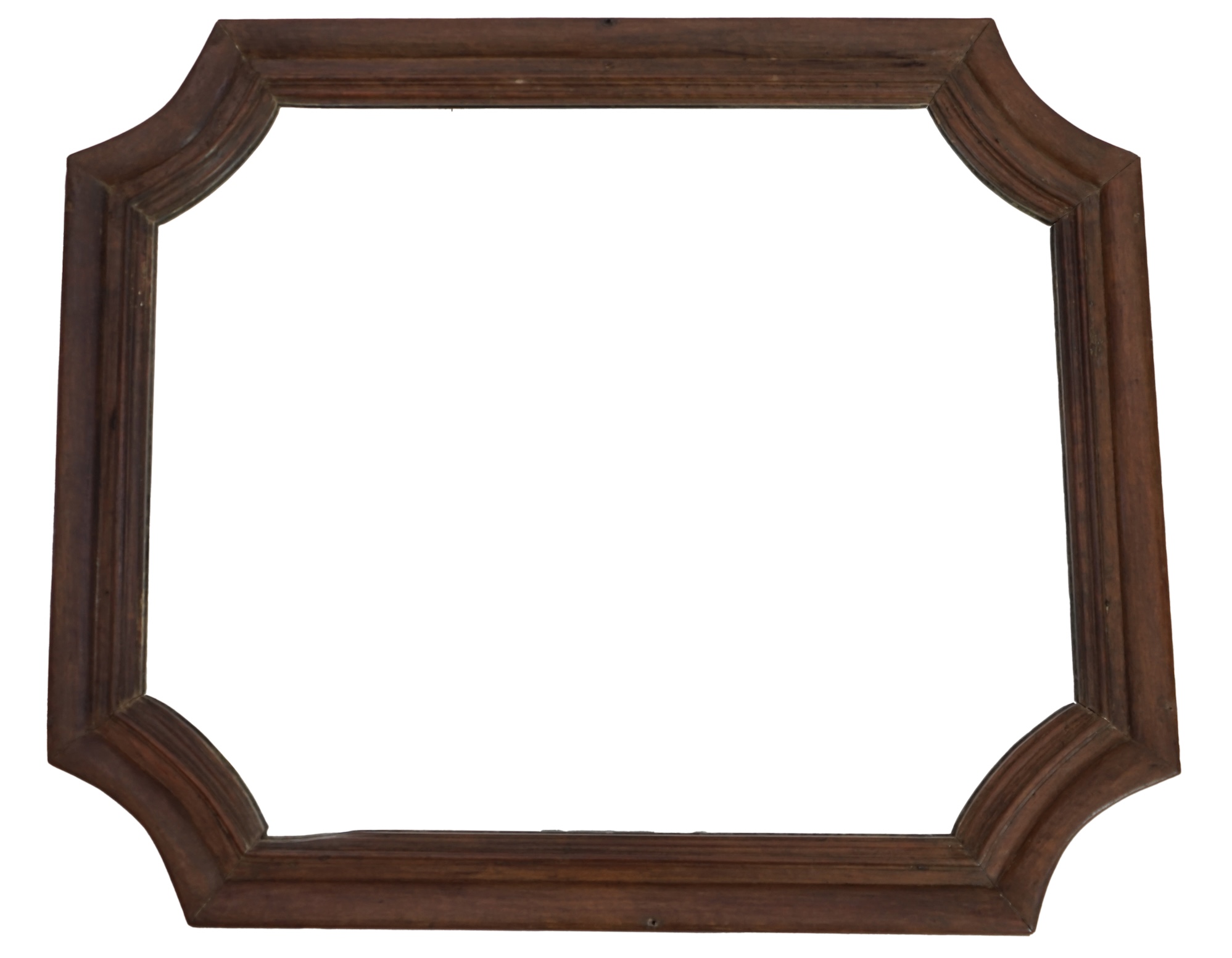 An antique French walnut wall mirror, of plain moulded cartouche form, width 140cm, height 117cm. Condition - fair